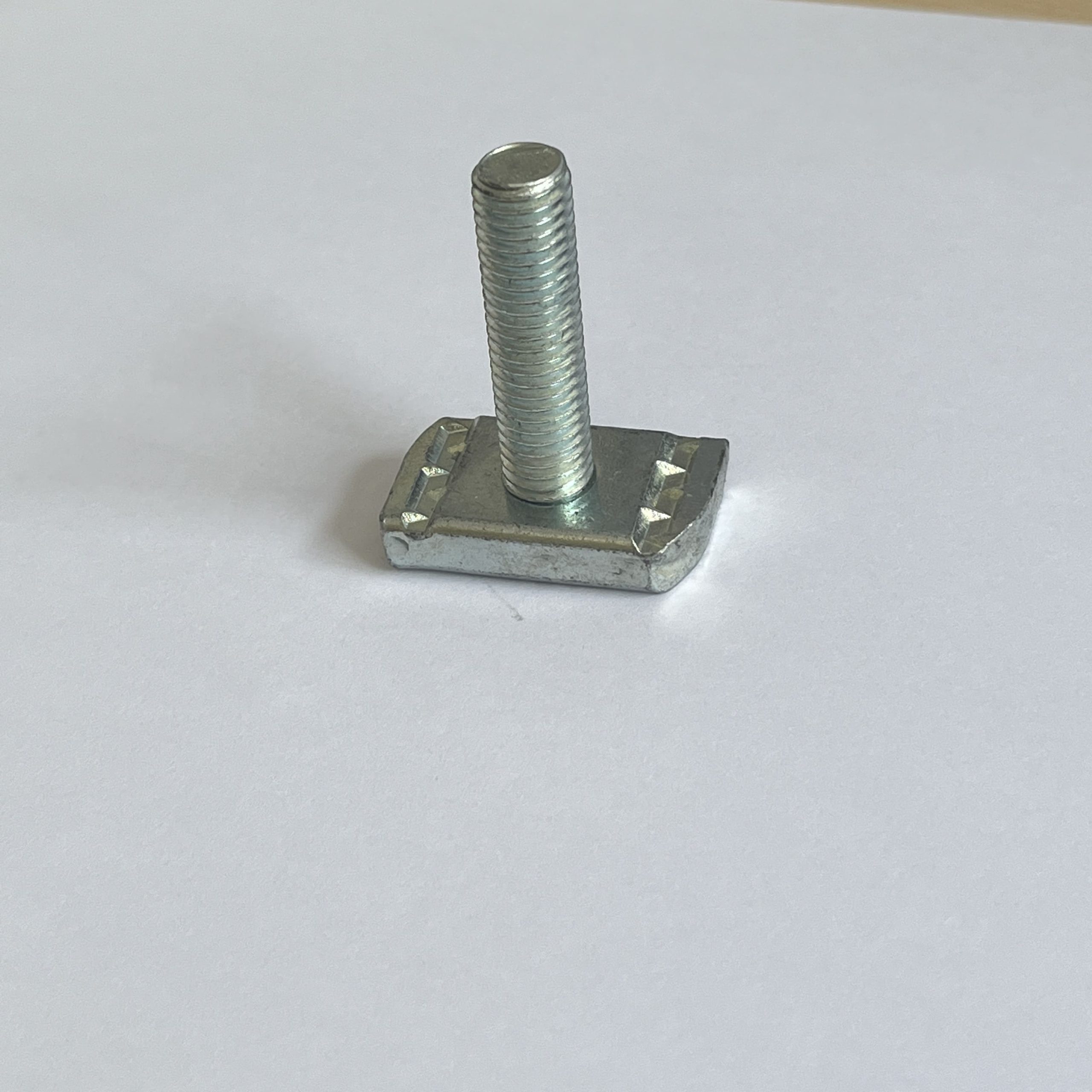 Strut channel nut with threaded stud